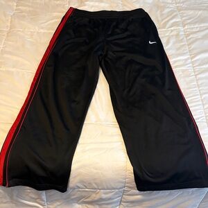 Nike Black Track Pants with Red Side Stripes